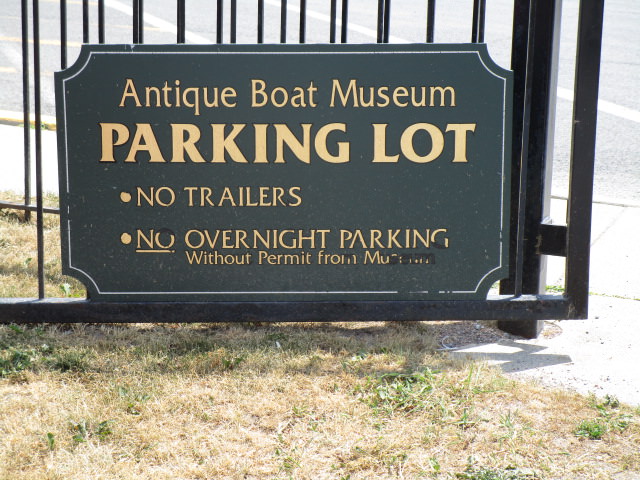 antique boat museum parking lot sign