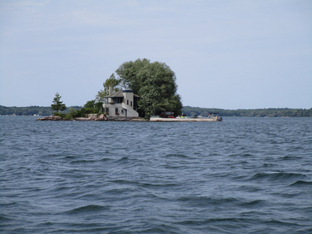 our tour boat island picture with house 2 even better