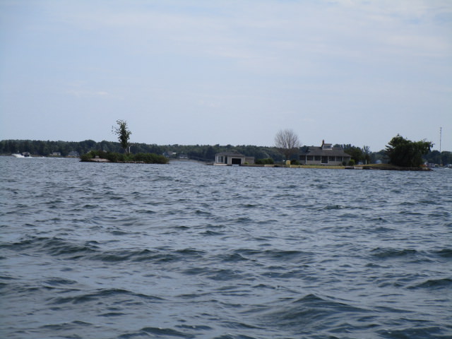 our tour boat island picture with house 3