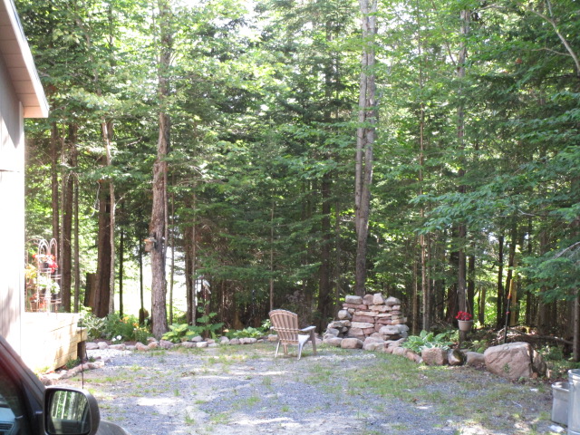 The Lake House fire pit and lake