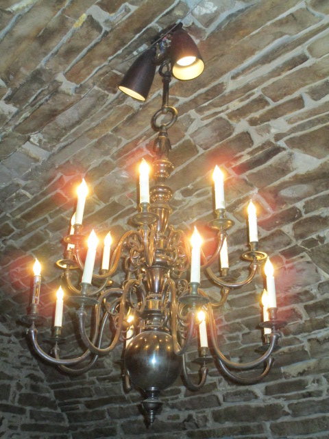 lamp with monk on top